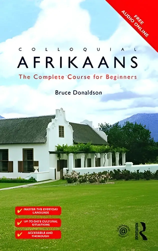De boek cover van colloquial afrikaans toont een wit huis en groene tuin onder een blauwe lucht voor de complete course for beginners