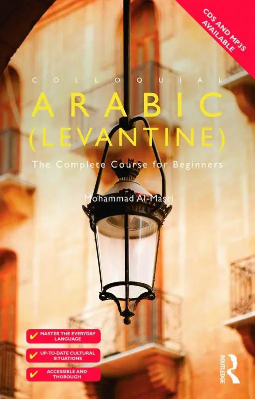 A black wrought iron lantern with clear glass hangs against a warm backdrop for the complete course for beginners
