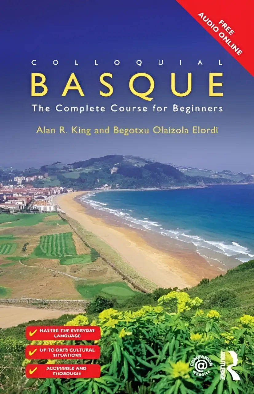 Complete language course colloquial basque book met levendig kustlandschap met gouden zand en turquoise wateren