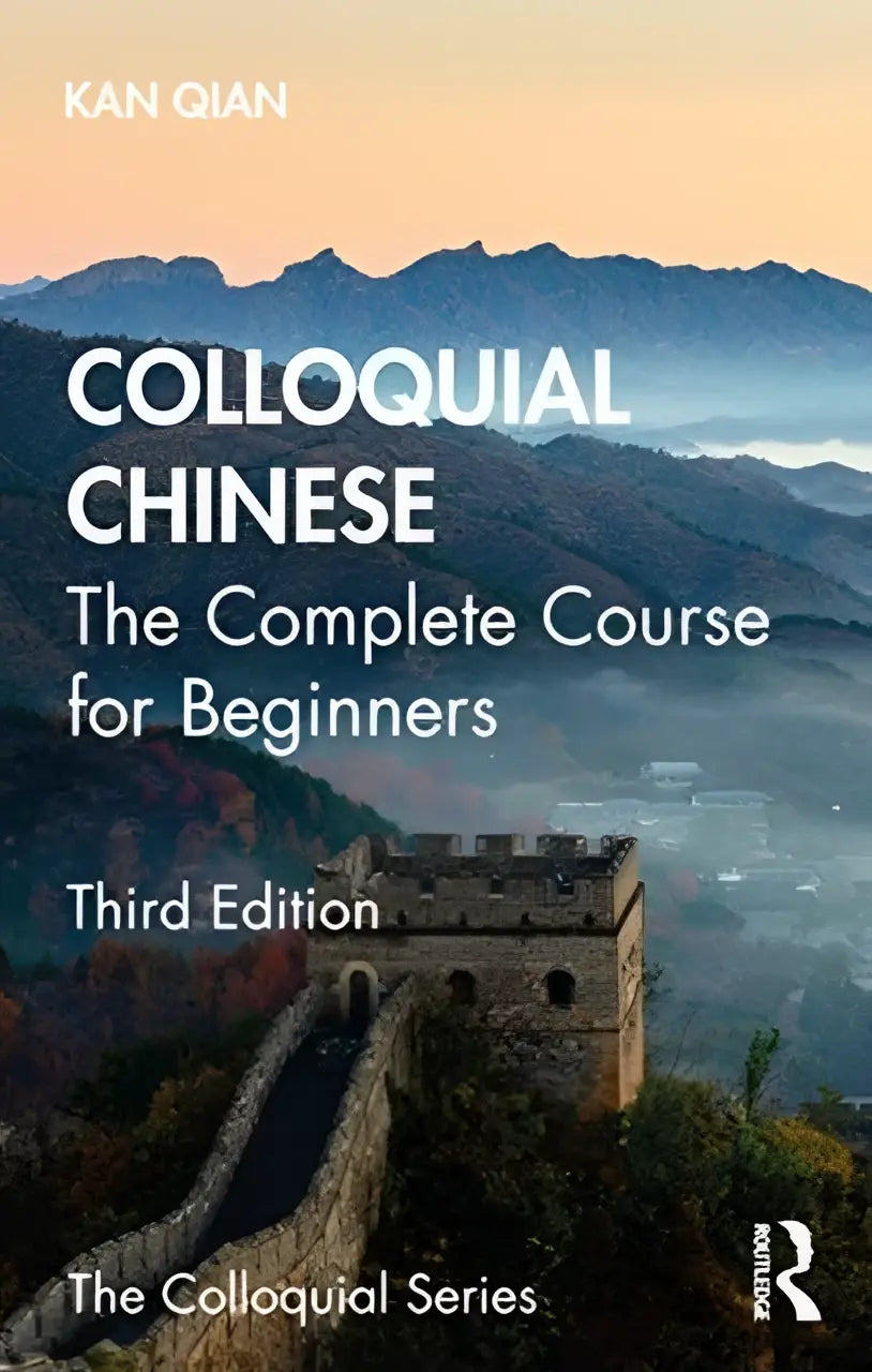 The cover of colloquial chinese the complete course for beginners features the great wall in misty mountains at sunrise