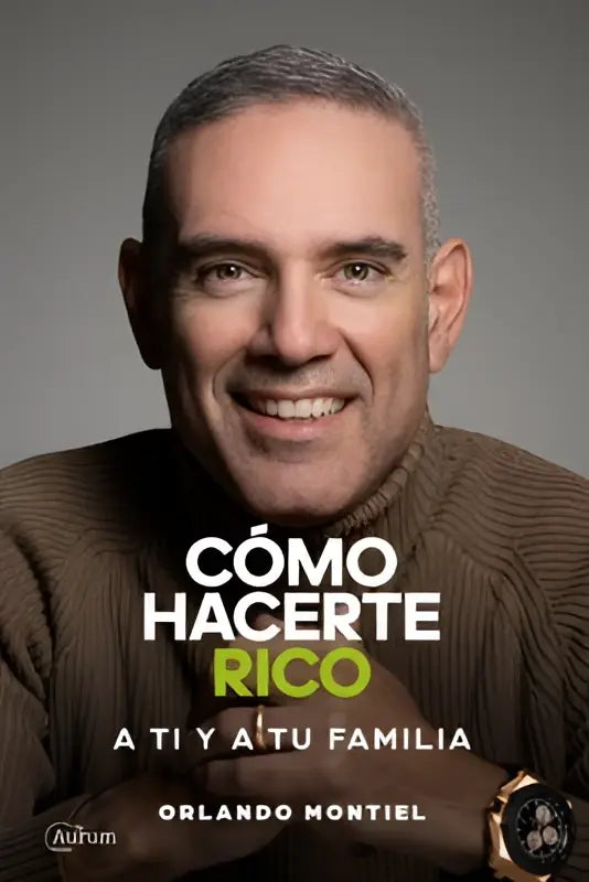 De boekcover toont een glimlachende man in een bruine trui met de titel cómo hacerte rico duidelijk zichtbaar