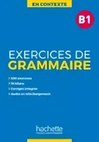 Blauw-wit frans grammaticaboek en contexte met exercices de grammaire in zwarte letters op de omslag