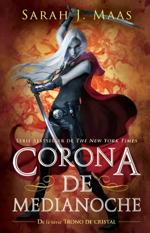 De boekcover van corona de medianoche toont een krijger met wit haar en een rode mantel tegen een vurige oranje achtergrond