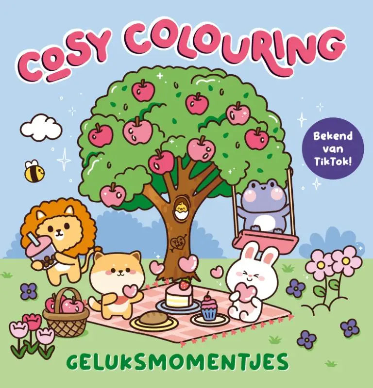 Een charmant geïllustreerd cosy colouring kleurboek met een betoverde appelboom en schattige dieren tijdens een picknick