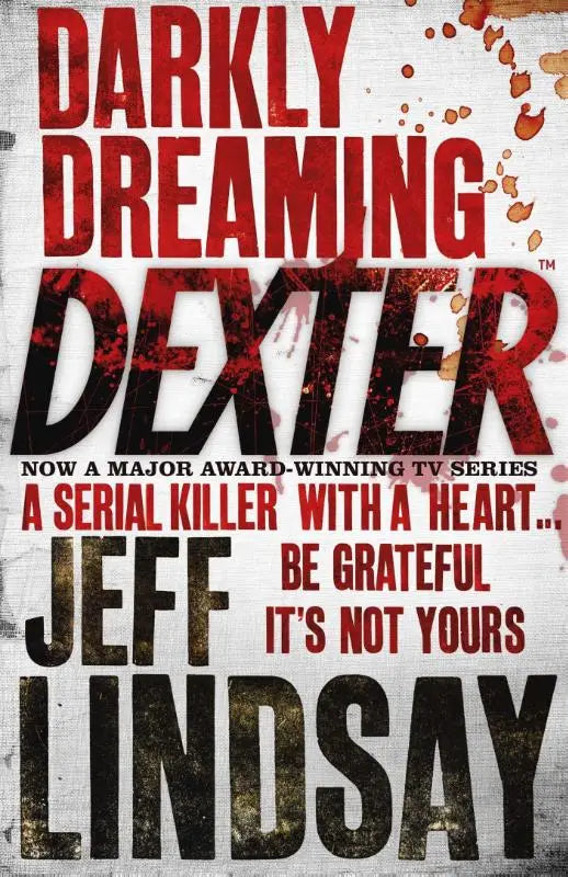 The book cover for darkly dreaming dexter features bold red and black text with blood splatter texture on white