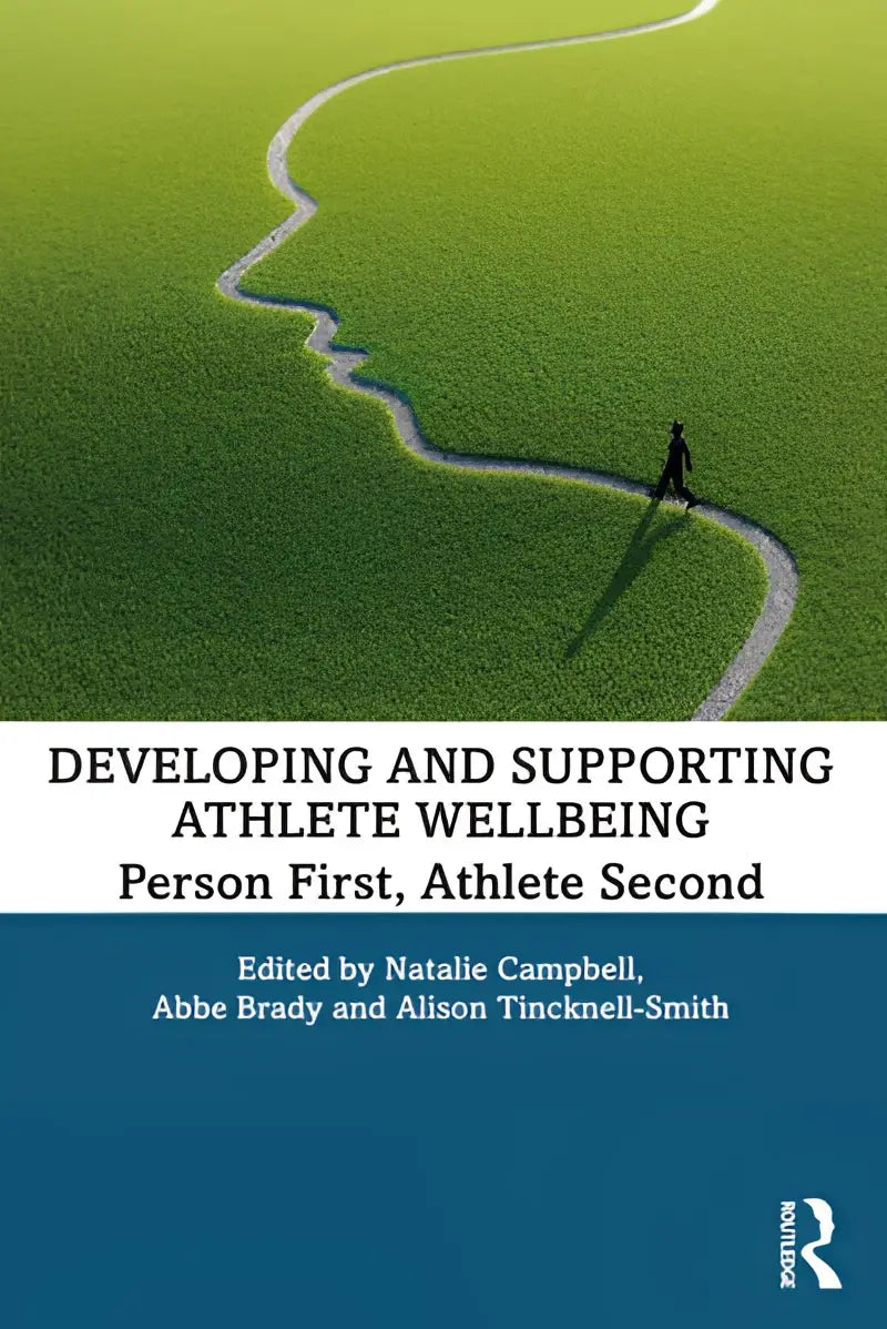 Boekomslag van developing and supporting athlete wellbeing met een witte kronkelende weg door groen gras leidt naar de titel