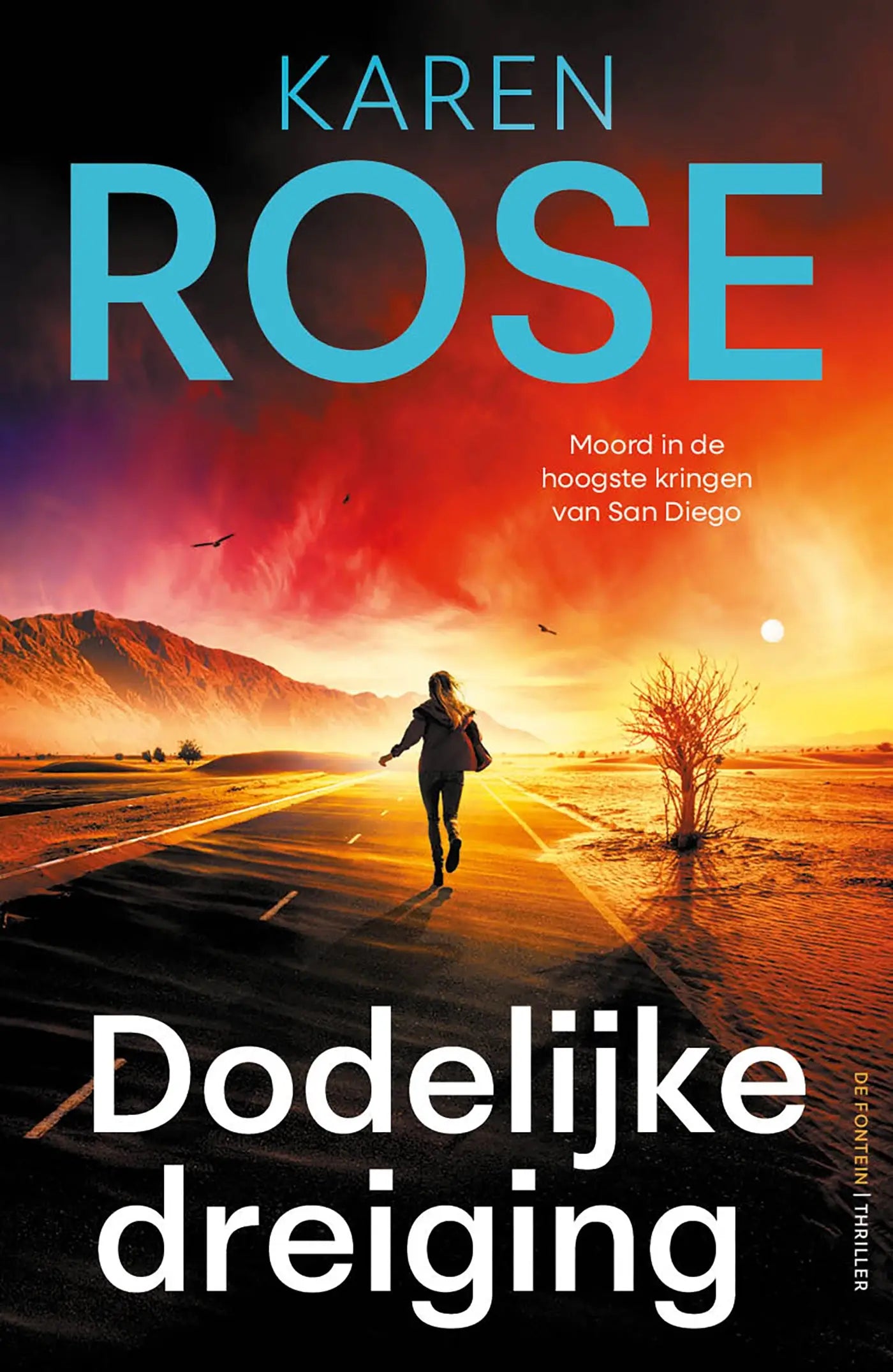 De boekomslag van dodelijke dreiging toont een dramatische zonsondergang boven een woestijnweg met auteur Karen Rose