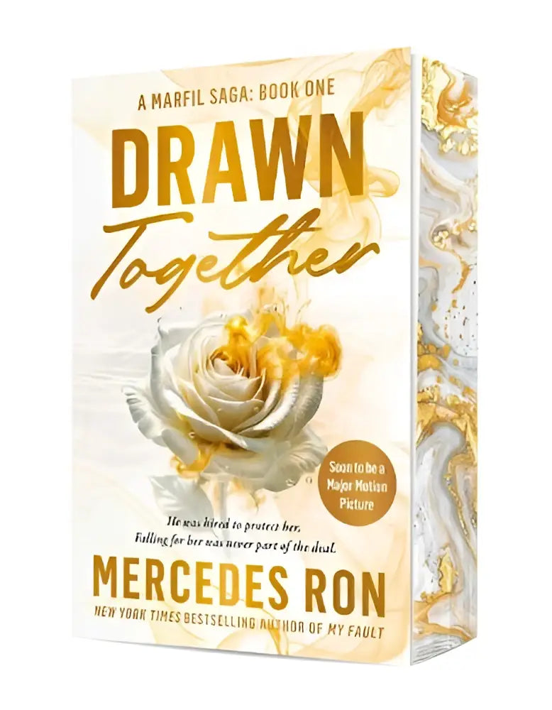 A white rose with golden accents decorates the cover of drawn together book one in the marfil saga billionaire bodyguard adult romance with romantic suspense and forbidden love