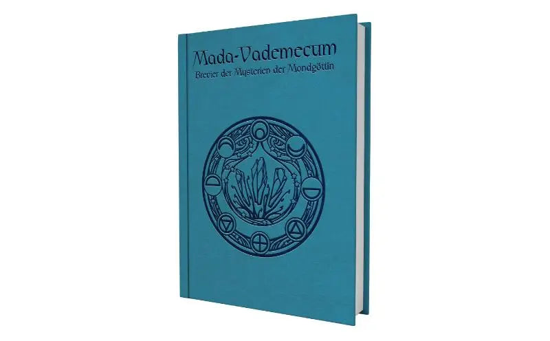 Teal hardcover boek mada-vademecum met geperst cirkeldesign en donkerblauwe titel voor dsa gebruik