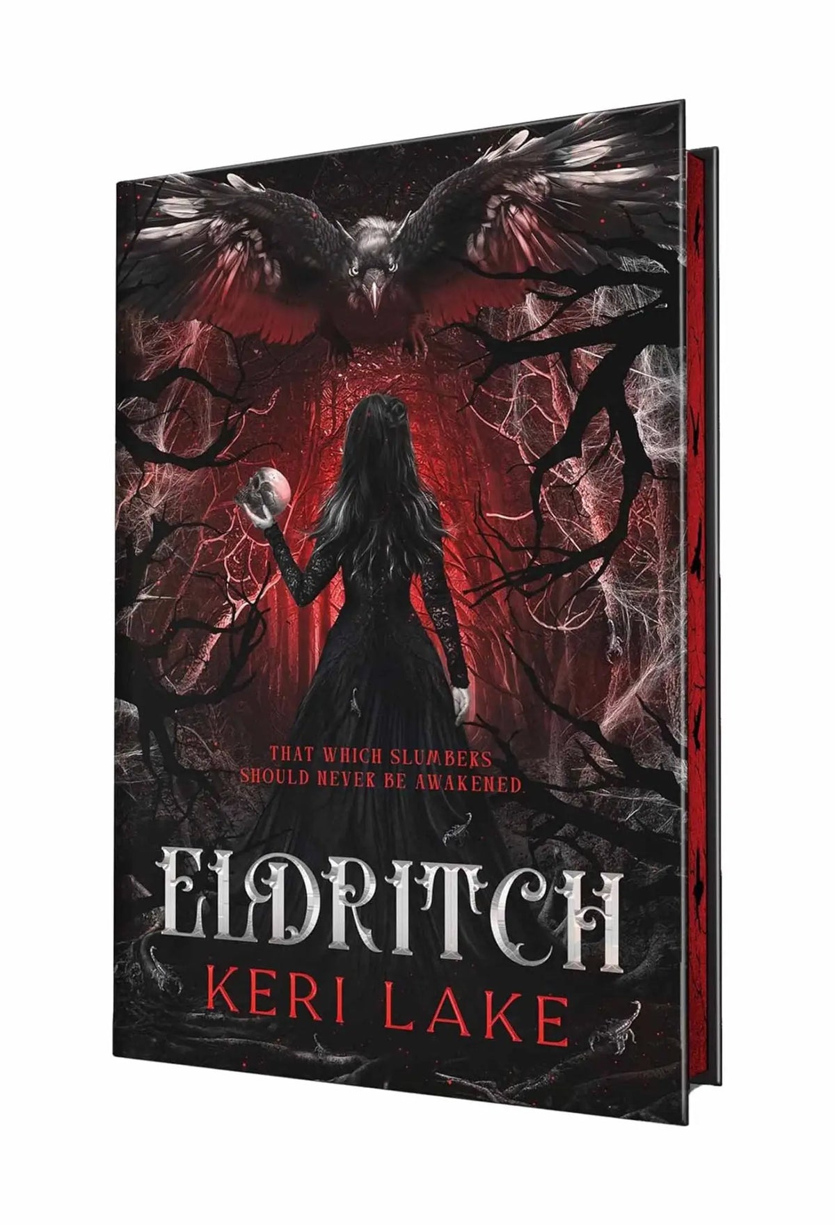 Deluxe edition black hardcover book eldritch by keri lake with red and black winged creature cover art from the eating woods