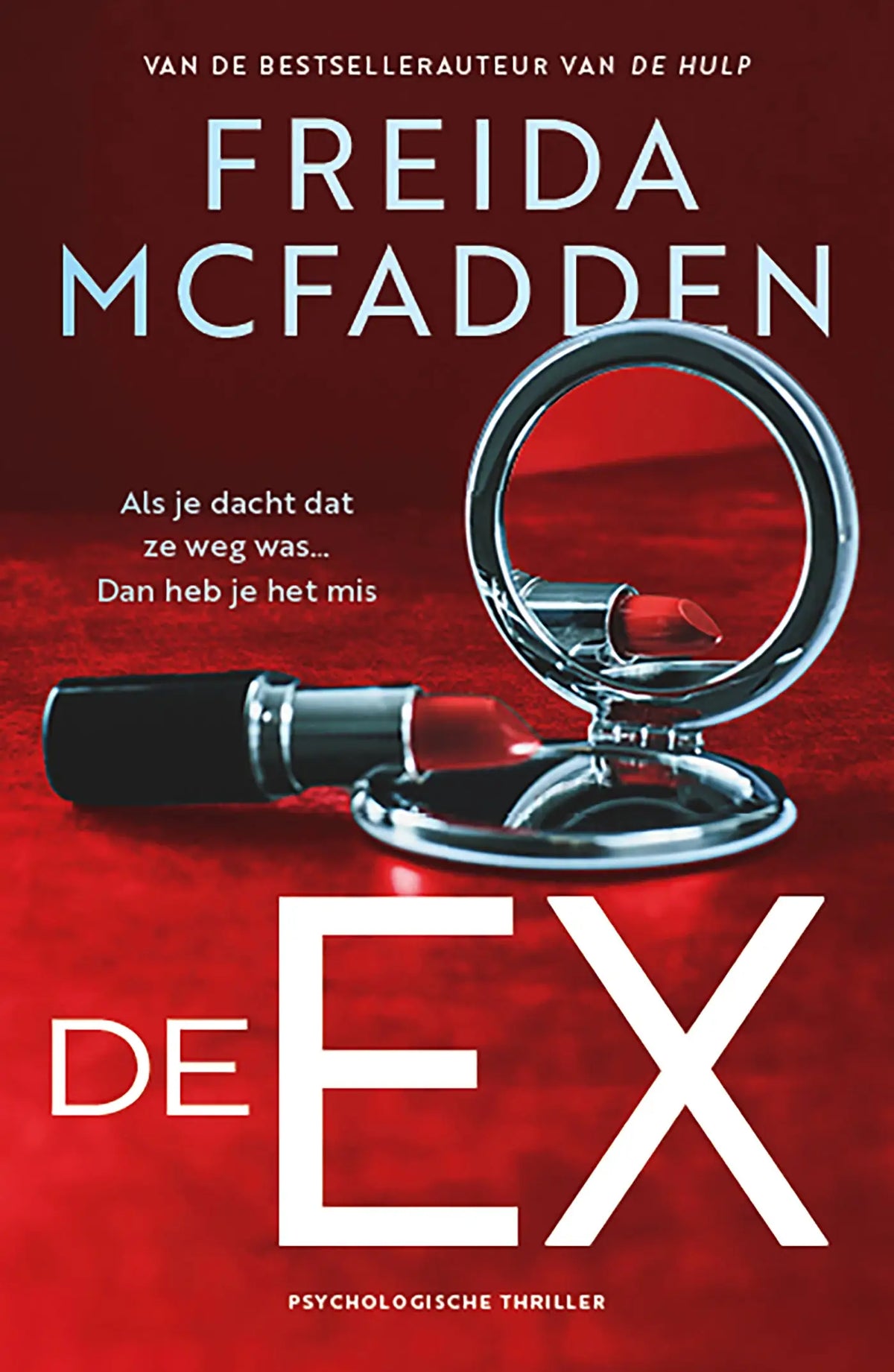 Een strak zwarte lipstick met een metalen zilveren compact spiegel op een felrode achtergrond freida mcfadden
