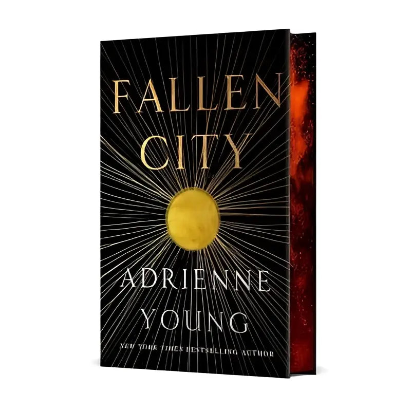 Zwarte hardcover fallen city boek met gouden letters en zonnestraalontwerp door adrienne young fantasy romance