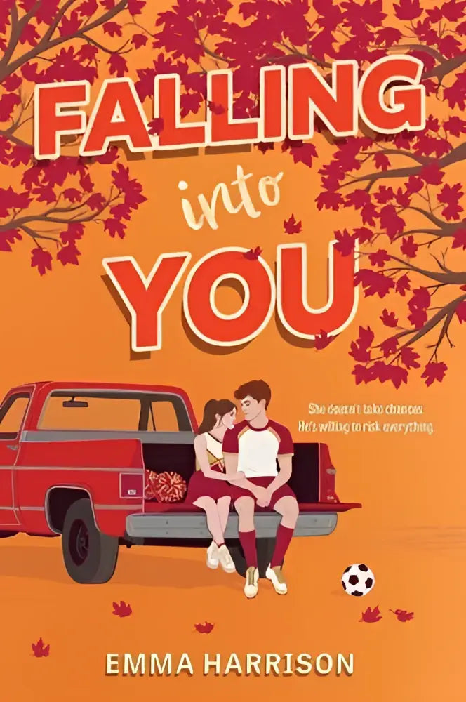 De boekcover van falling into you toont de titel in oranje en witte letters tegen een oranje achtergrond met rode esdoornbladeren