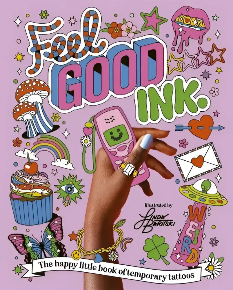 Roze vintage flipphone met blij gezicht op scherm in de happy little book van feel good ink tijdelijke tattoos