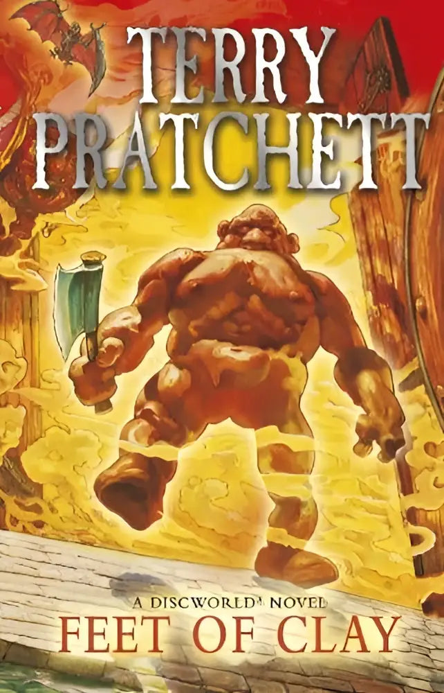 The cover of terry pratchetts feet of clay features a muscular brown-skinned giant wielding an axe in a fiery scene for discworld novels avontuurlijke fictie