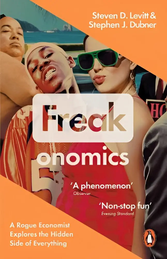 The book cover of freakonomics by steven d is a rogue economist explores the hidden side of everything in a white design
