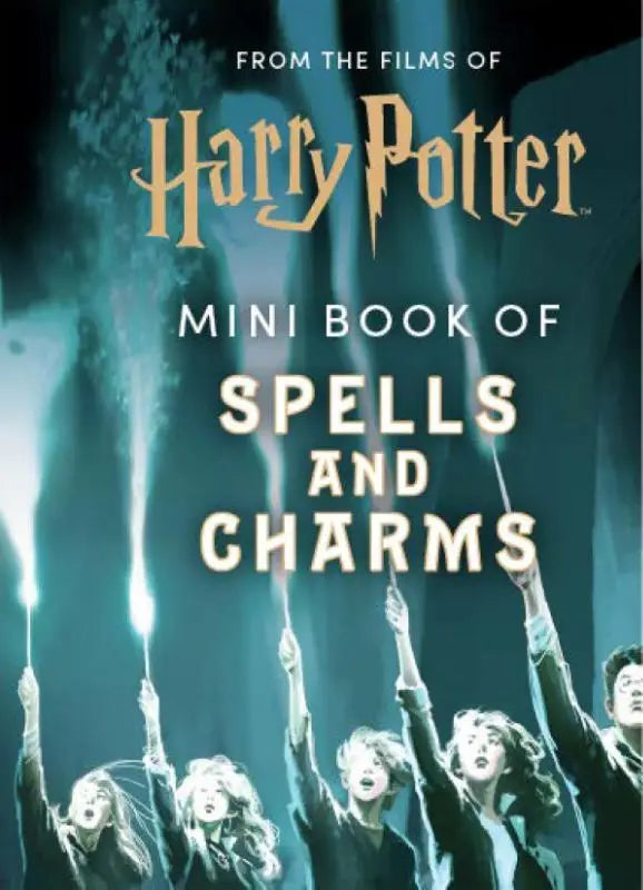 Mini book of spells and charms from the films of harry potter featuring illustrated characters with wands on teal background