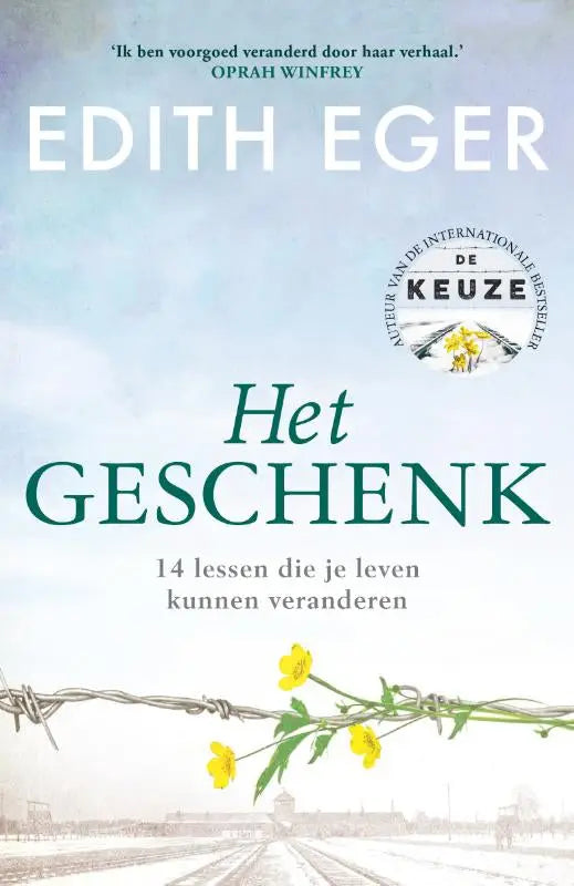 Het geschenk door edith eger met gele bloemen door prikkeldraad tegen blauwe hemel voor lessen die leven veranderen