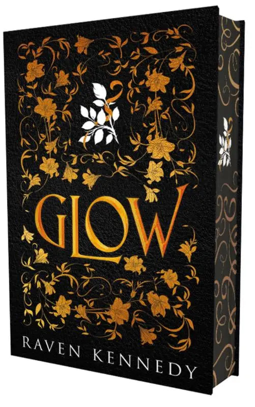Zwart hardcover boek glow door raven kennedy met gouden en witte bloemmotieven, perfect voor fans van gouden gevangene