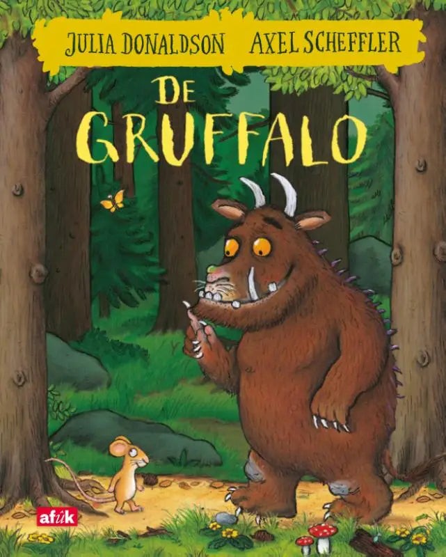 Brown, harige gruffalo met witte hoorns en slagtanden staat in bos voor het boek de gruffalo voor jonge lezers