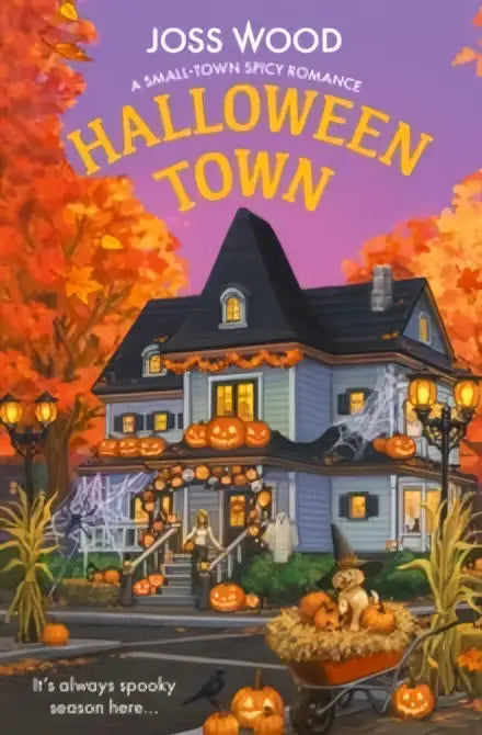 Een eng, twee verdiepingen tellend blauw huis met zwarte luiken en gloeiende oranje pompoenen in halloween town joss wood