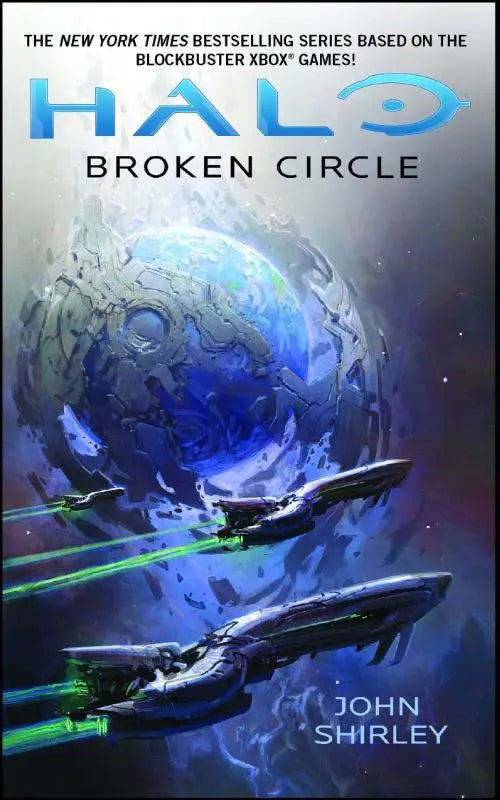 De cover van het halo broken circle boek door john shirley toont een blauwgrijze sci-fi scène met ruimteschepen bij een ringplaneet
