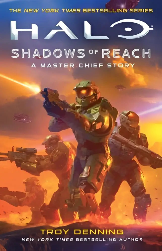 De cover van halo shadows of reach toont master chief in zijn groene en zwarte harnas in een oranje slagveld voor chief story