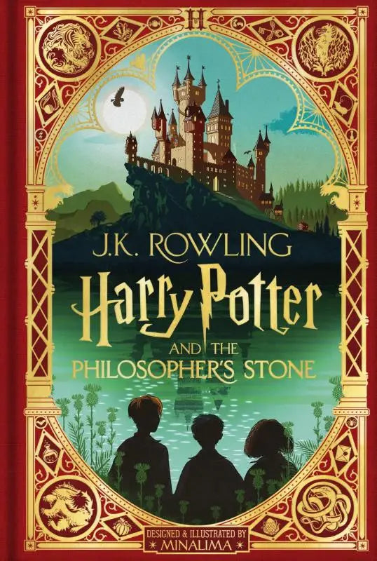 Rode hardcover boek harry potter and the philosophers stone minalima edition met goudkleurige rand en illustratie van hogwarts castle