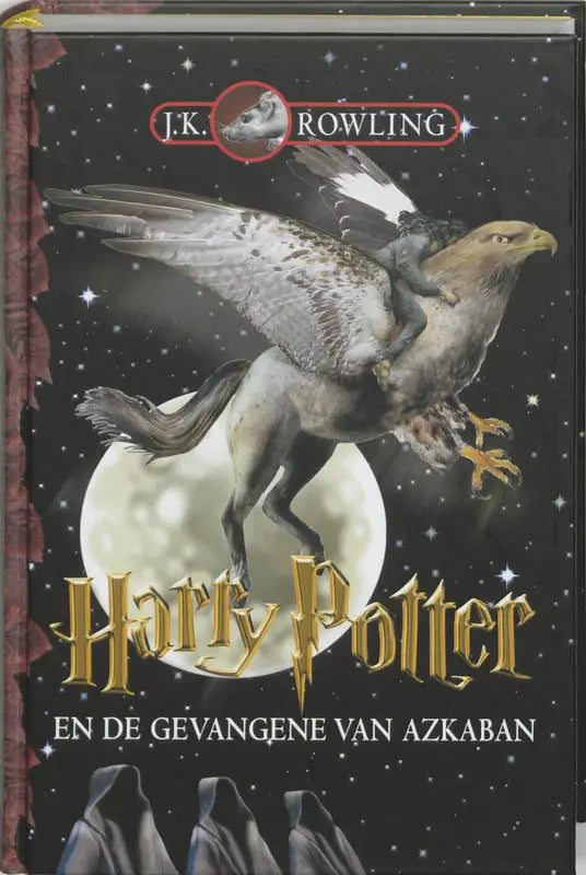 Hardcover harry potter boek met zwarte omslag, goudkleurige titel en afbeelding van een griffioen vliegend over een volle maan
