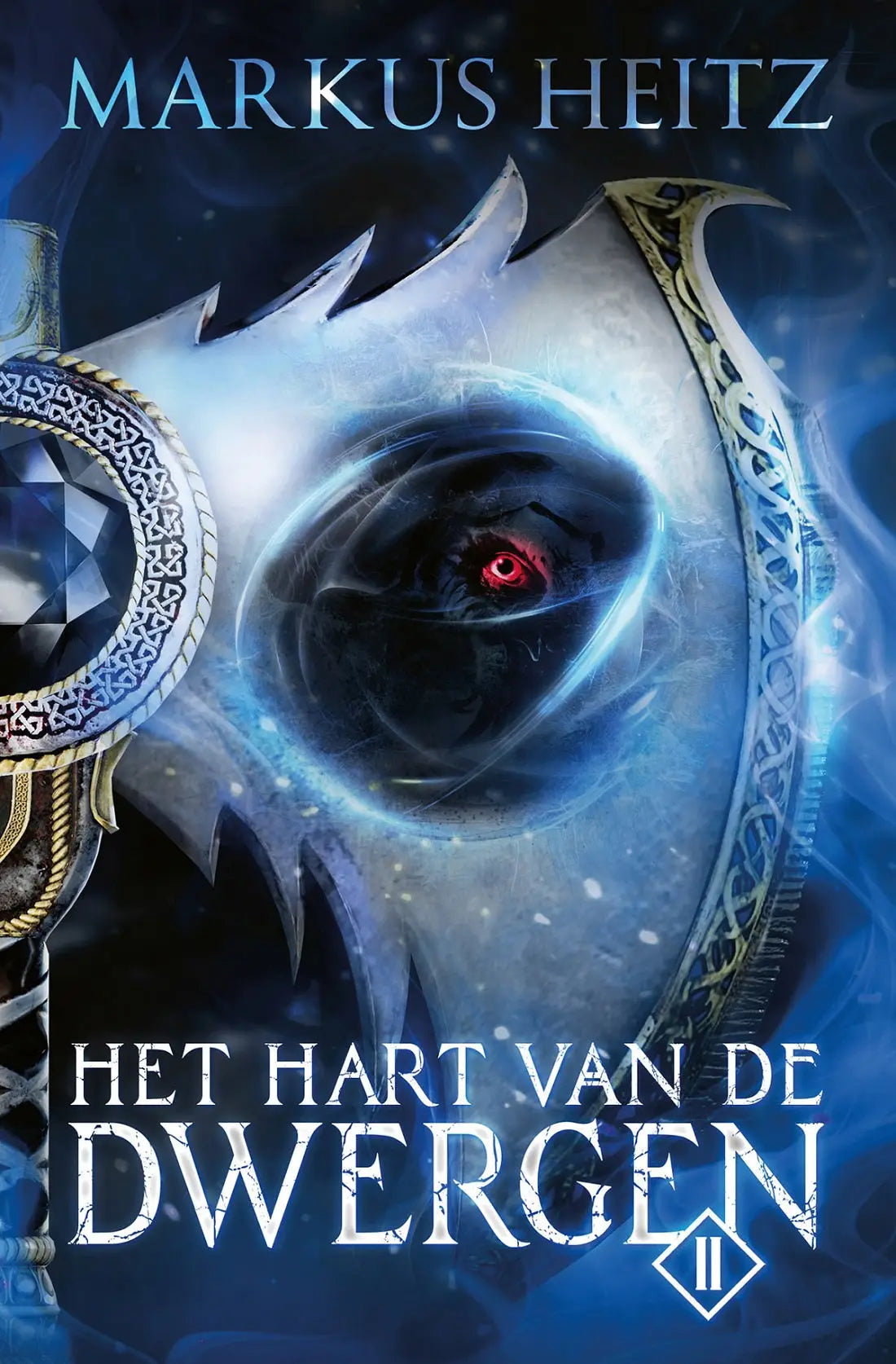 Een metalen ornate zwaardheft met gedetailleerd goud en zilver bij het boek het hart van de dwergen van markus heitz uitgegeven door luitingh sijthoff