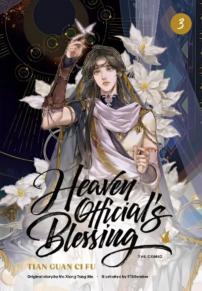 The cover of heaven official’s blessing the comic volume 3 features a character in flowing white and purple fabrics against a dark celestial backdrop