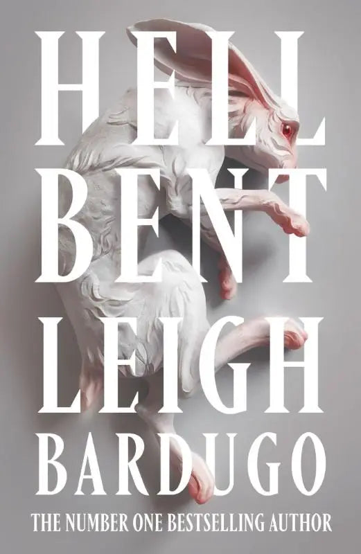 Boekcover van hell bent met een witte gebeeldhouwde konijn met rode ogen van de instant sunday times bestselling global sensation