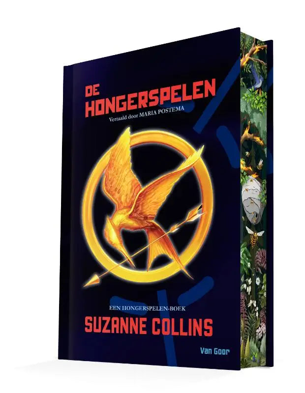 Donkerblauw hardback boek met gouden mockingjay en rode tekst de hongerspelen van suzanne collins