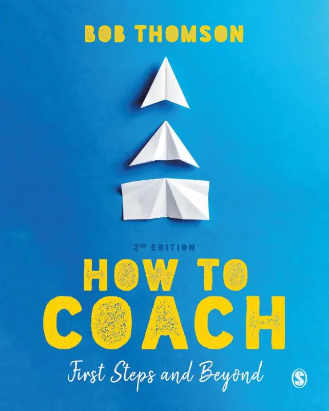 Blauwe boekomslag van how to coach tweede editie van bob thomson met focus op first steps and beyond
