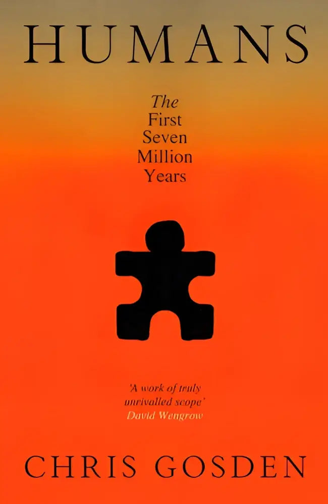 De boekcover van humans door chris gosden toont een zwarte puzzelstuk silhouette op een oranje verloop achtergrond