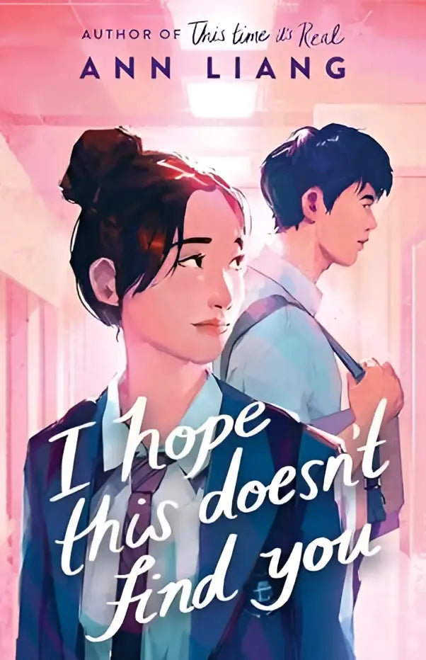 The book cover of I hope this doesnt find you shows an illustrated young woman with bun and man in pink hallway