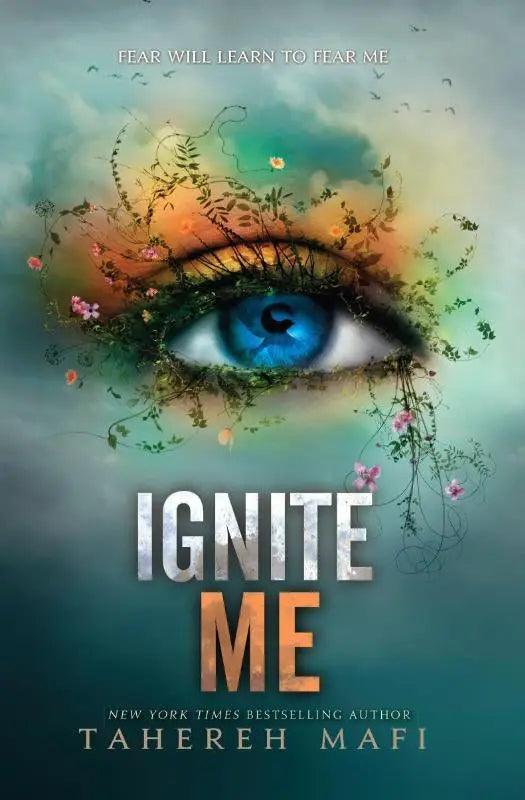 Vividly illustrated eye with striking blue iris and delicate vines in green orange and pink on ignite me by tahereh mafi