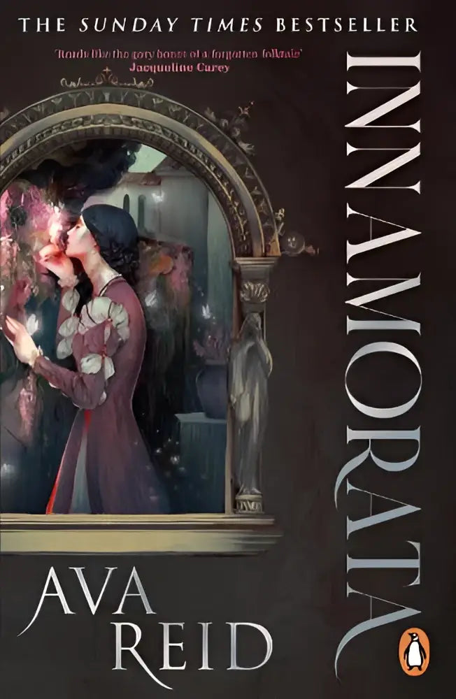 The del rey physical book cover of innamorata by ava reid shows a dark ornate illustration of two figures in an embrace