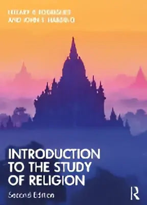 De boekomslag van introduction to the study of religion toont een silhouet van een tempel bij een oranje paarse zonsondergang