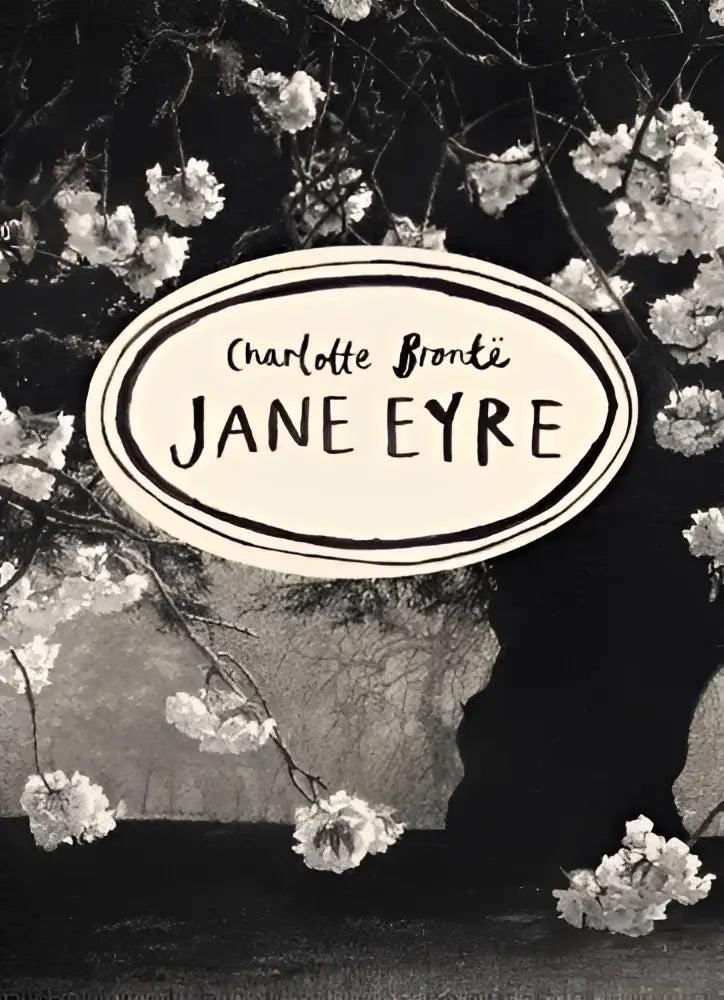 Zwart-wit boekcover van jane eyre door charlotte brontë met ovaal kader en bloemenachtergrond uit classics bronte series