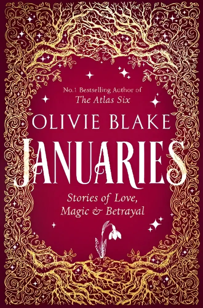 De cover van het boek januaries van olivie blake toont de titel op een dieprode achtergrond met gouden boompatronen