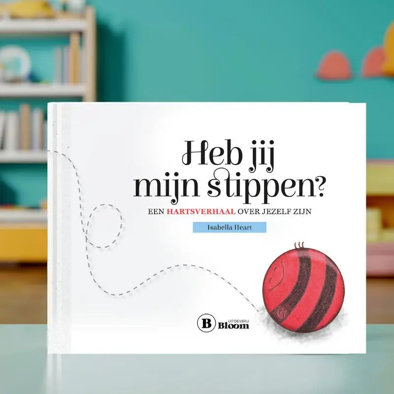 Witte hardcover kinderboek heb jij mijn stippen met zwart en rood illustratietekst en cartoon gestreepte bal op de voorkant