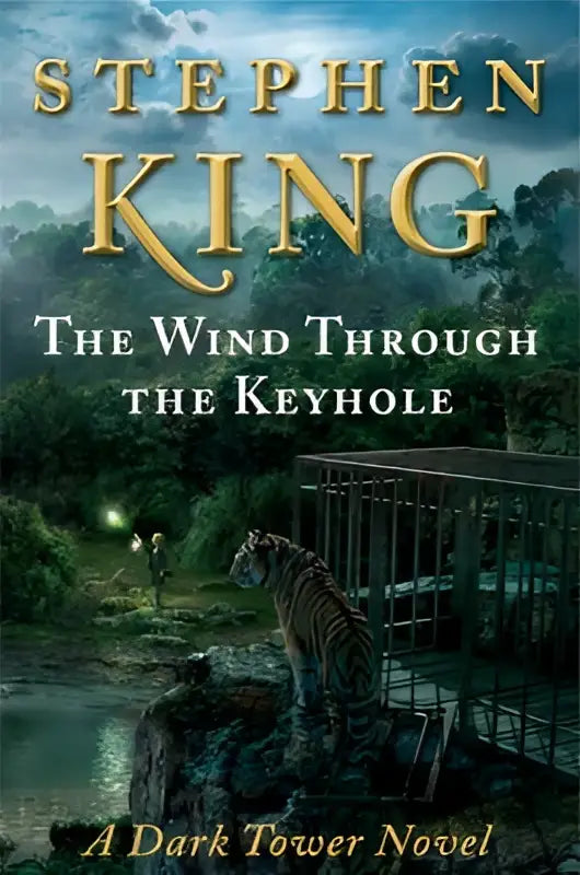 De boekomslag van king s wind through the keyhole toont een tijger bij maanlicht op rotsen naast water