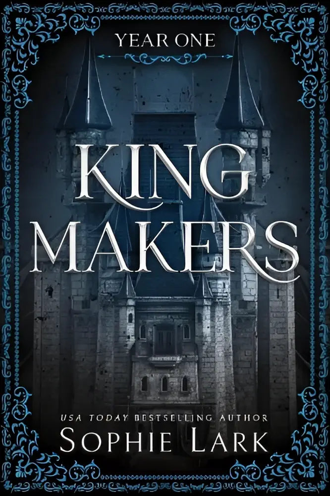 The book cover for kingmakers year one by sophie lark shows a gothic castle with blue borders and silver lettering perfect for spicy friends romance