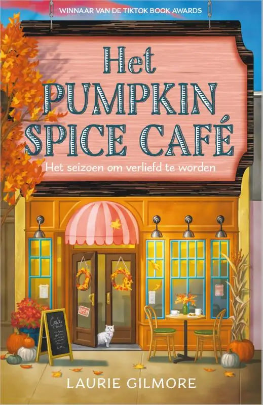 De boekcover van laurie gilmore dream harbor toont het pumpkin spice café met herfstdecoraties en heldere letters