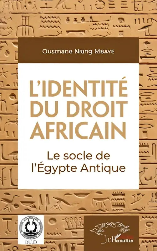 Boekomslag van lidentiteit du droit africain met gouden letters en egyptische hiërogliefen over lÉgypte antique en afrikaanse recht