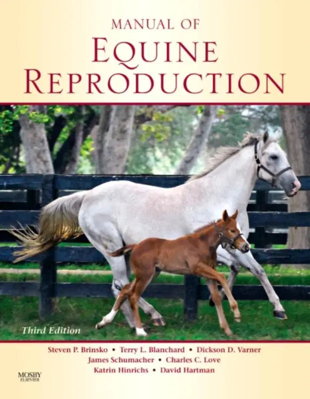 De cover van manual of equine reproduction derde editie toont een witte volwassen paard en een bruin veulen bij een zwarte houten omheining voor reproductief management