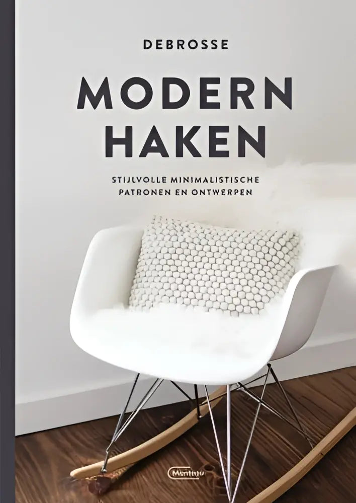 Witte moderne haken schommelstoel met slanke metalen poten en een textuur gebreid kussen