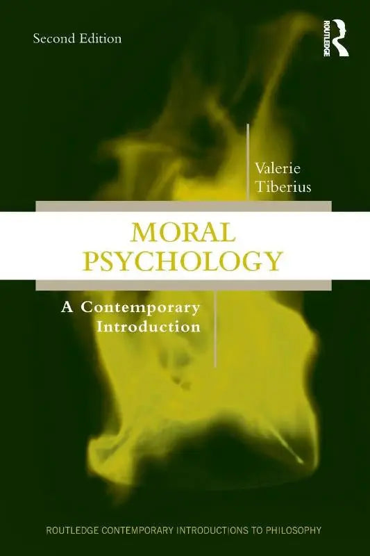 De boekcover van moral psychology a contemporary introduction heeft een donkergroene achtergrond met gouden letters en een gele schedel