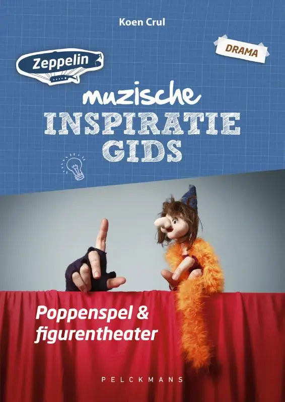 Oranje harige pop met blauwe feesthoed als onderdeel van de muzische inspiratiegids productlijn